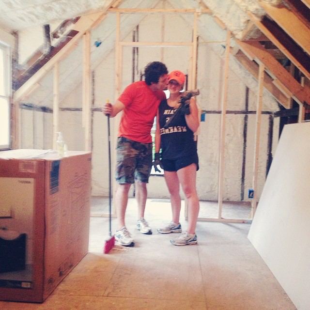 Nathan and Jacqueline Spearing in the attic of their historic home mid-remodel