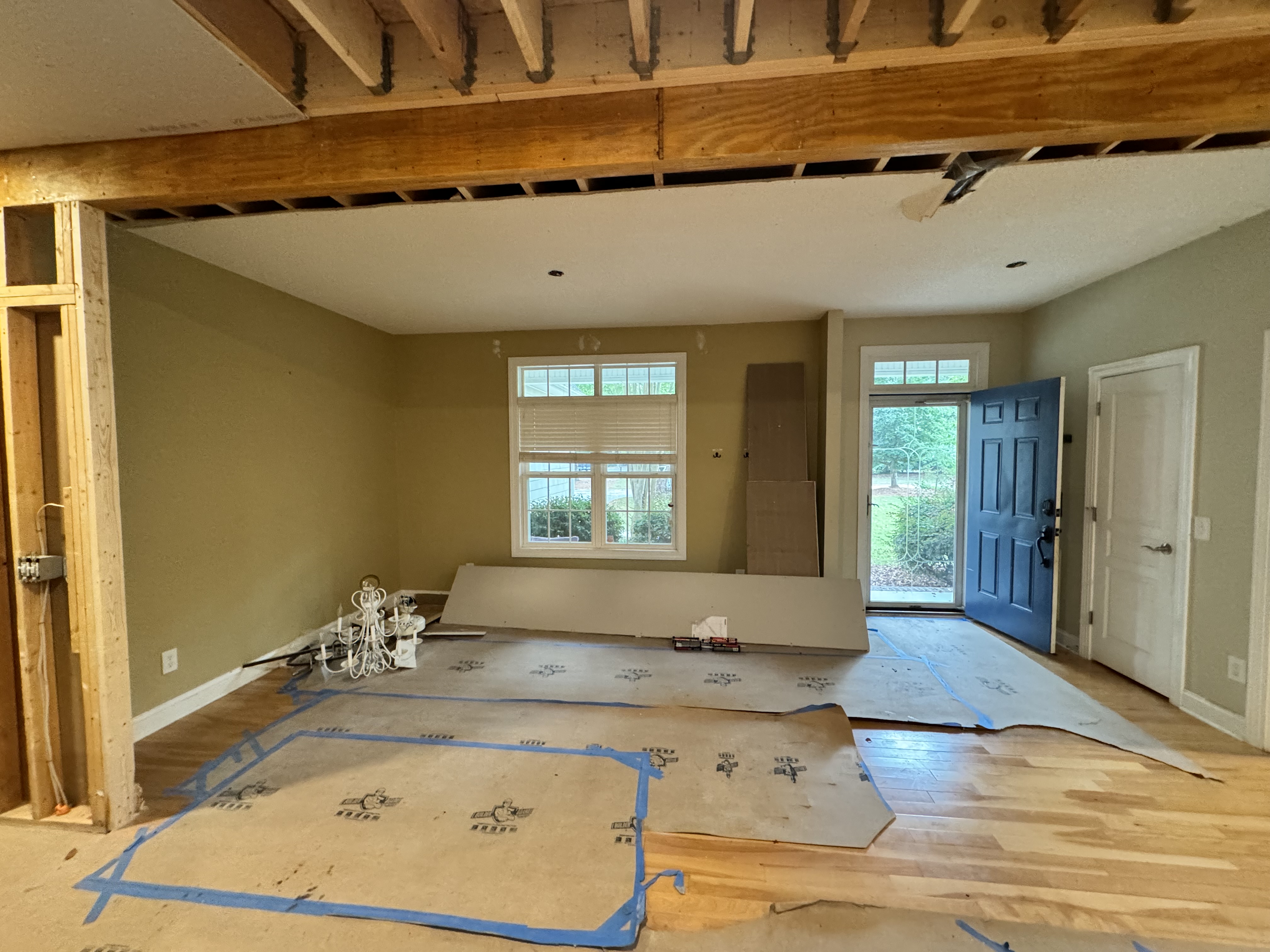 LVL beam visible from below — structural backbone of the attic conversion