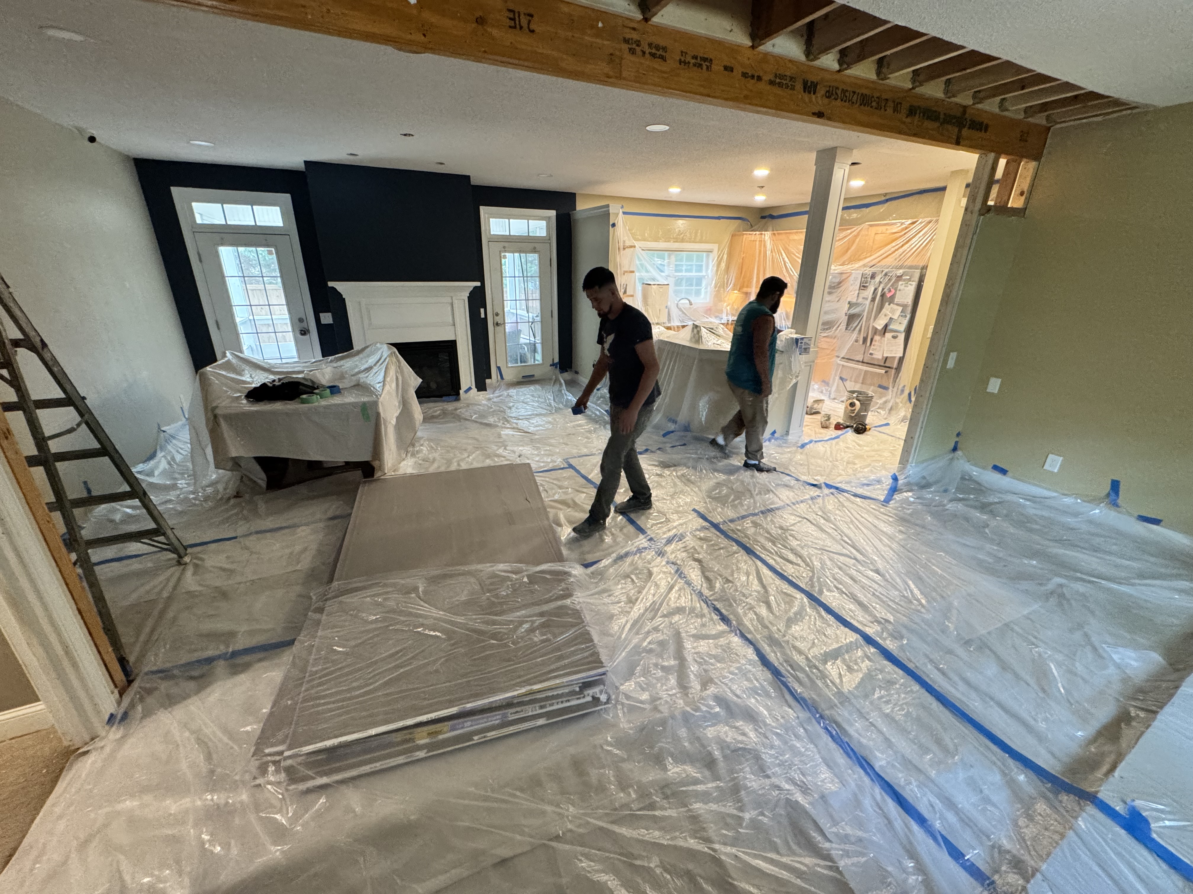 Drywall delivery to the attic with main level protected during construction