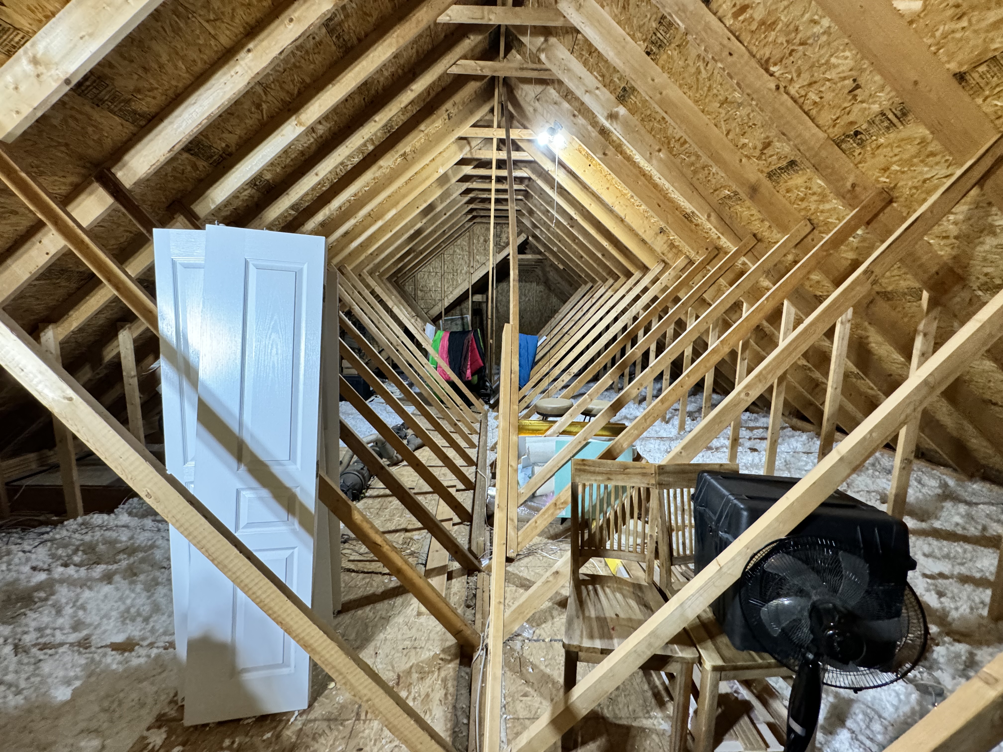 Existing cross-bracing in the attic requiring structural modification