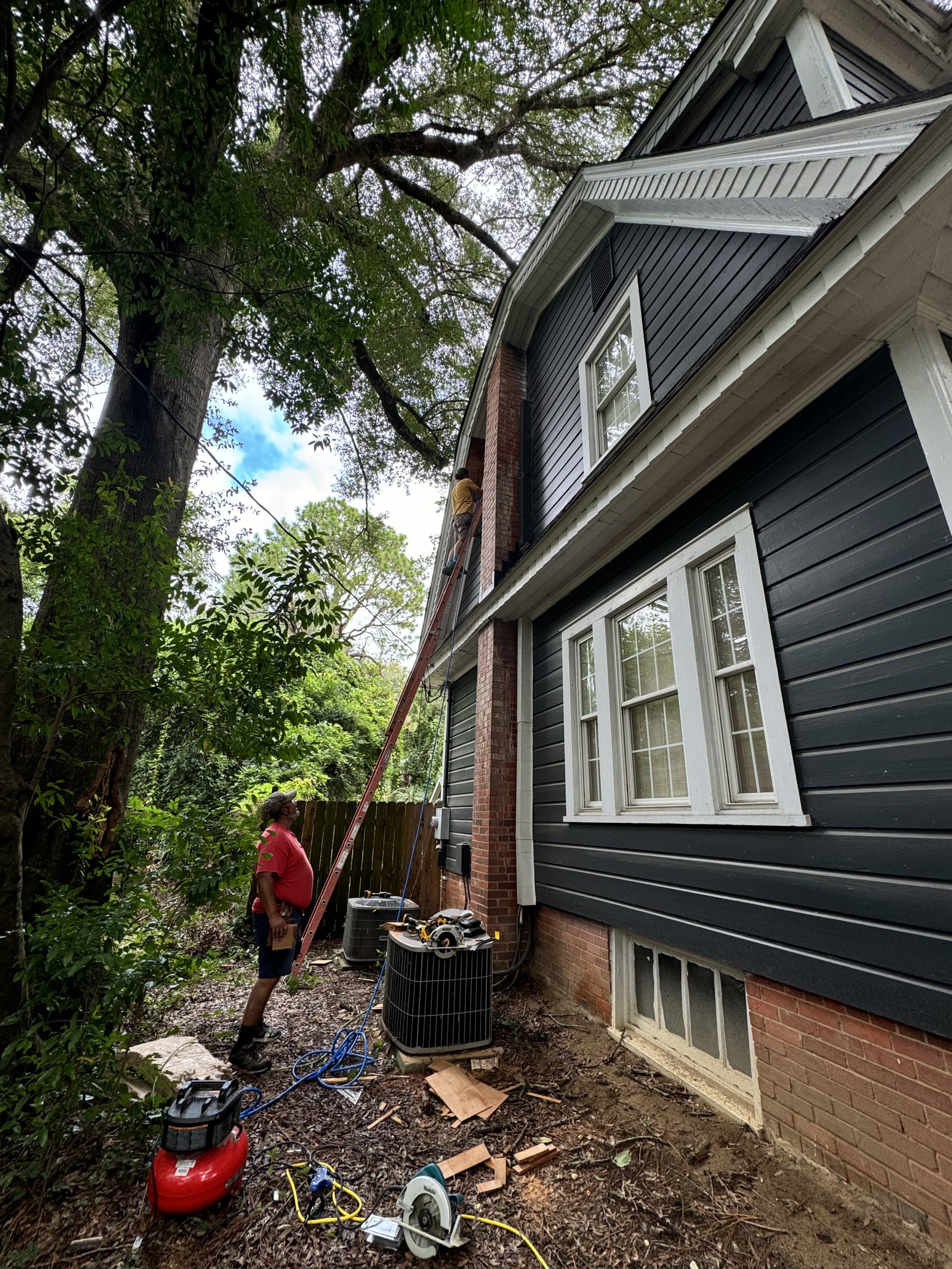 Side view showing architectural details matching main house