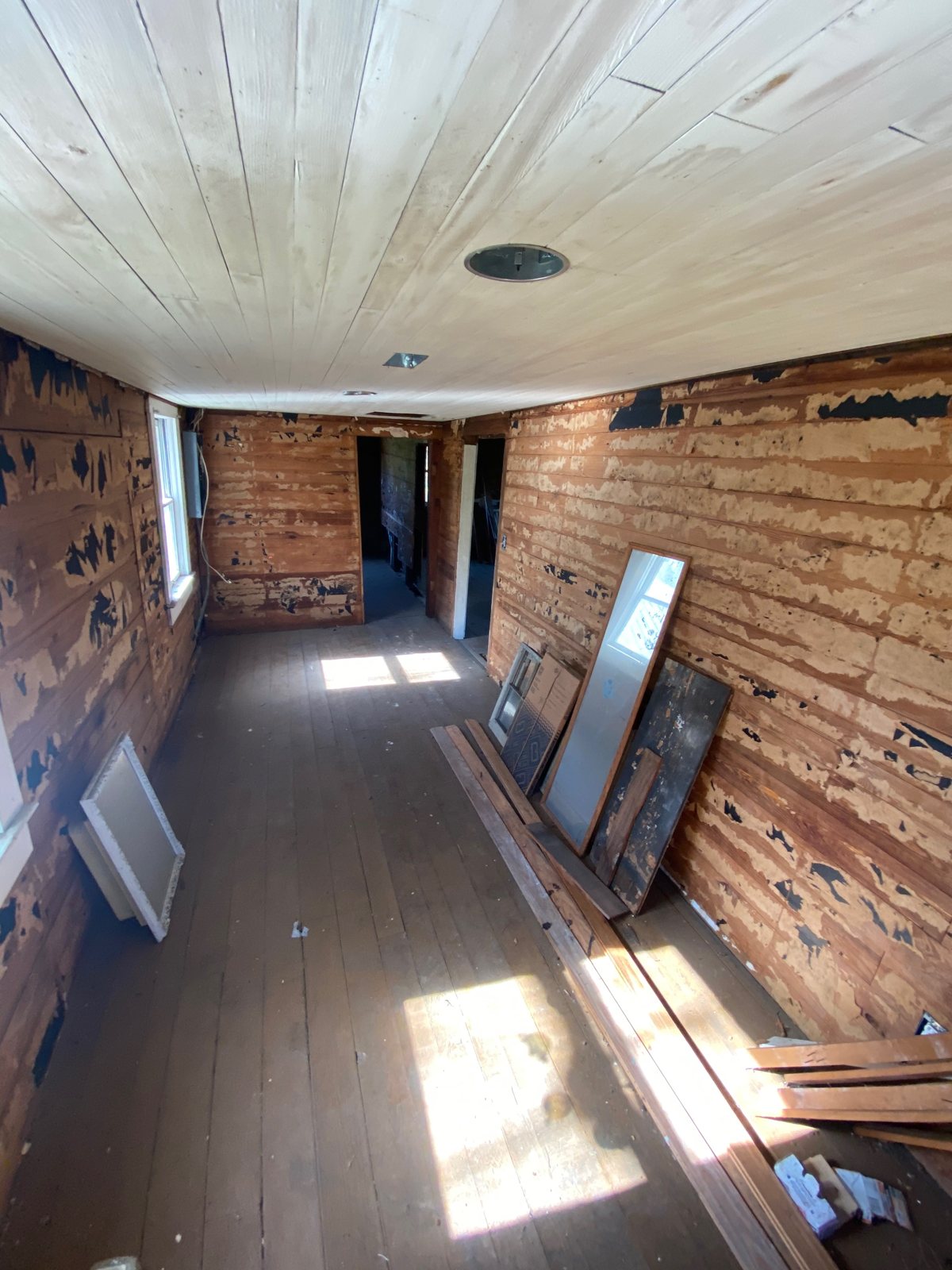 Looking through the main house toward the back door. The fall in the floor is visible from here