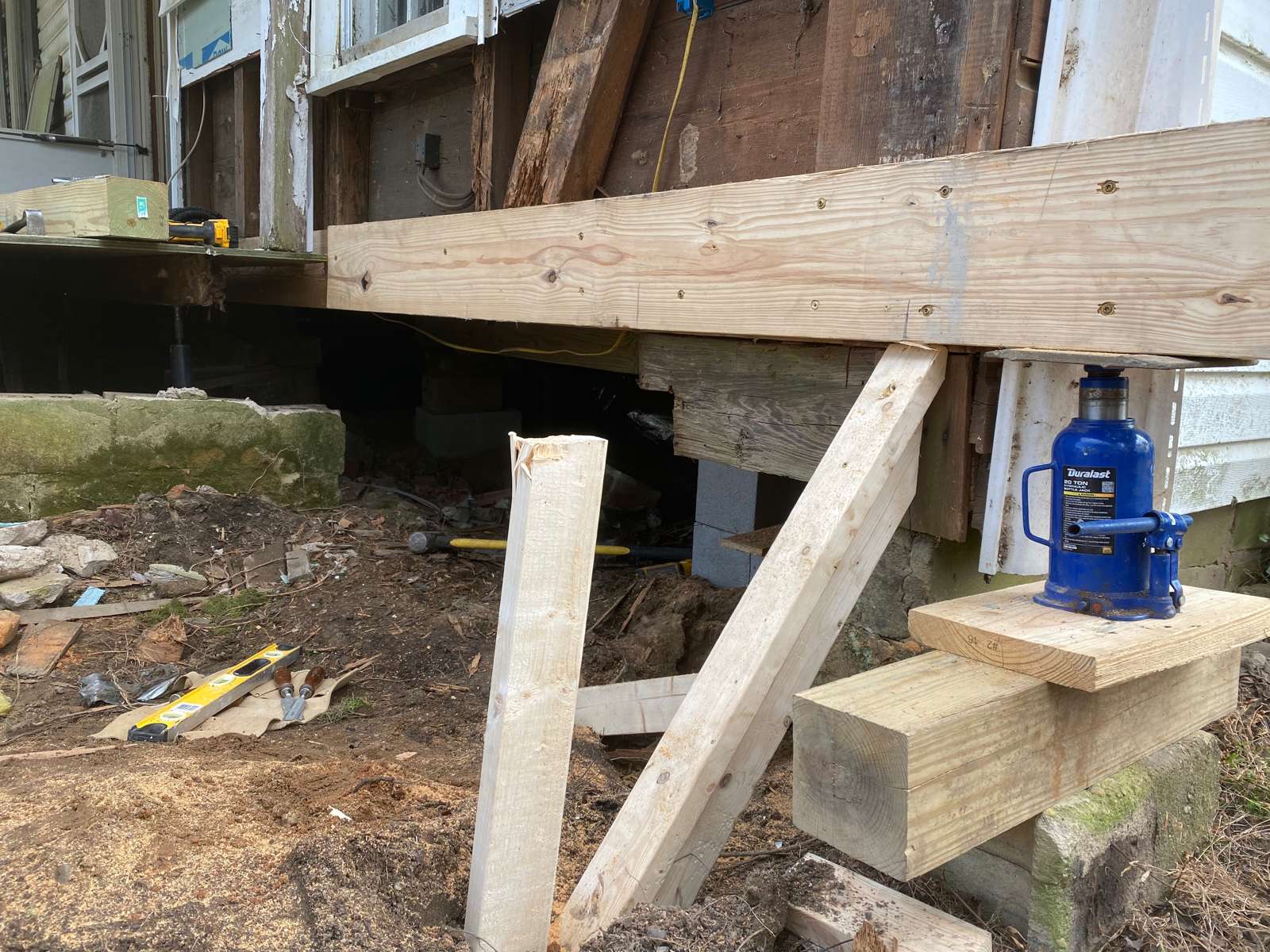 We affectionately refer to this process as house Tetris. The process where we stabilize existing framing so that we can adjust the foundation below