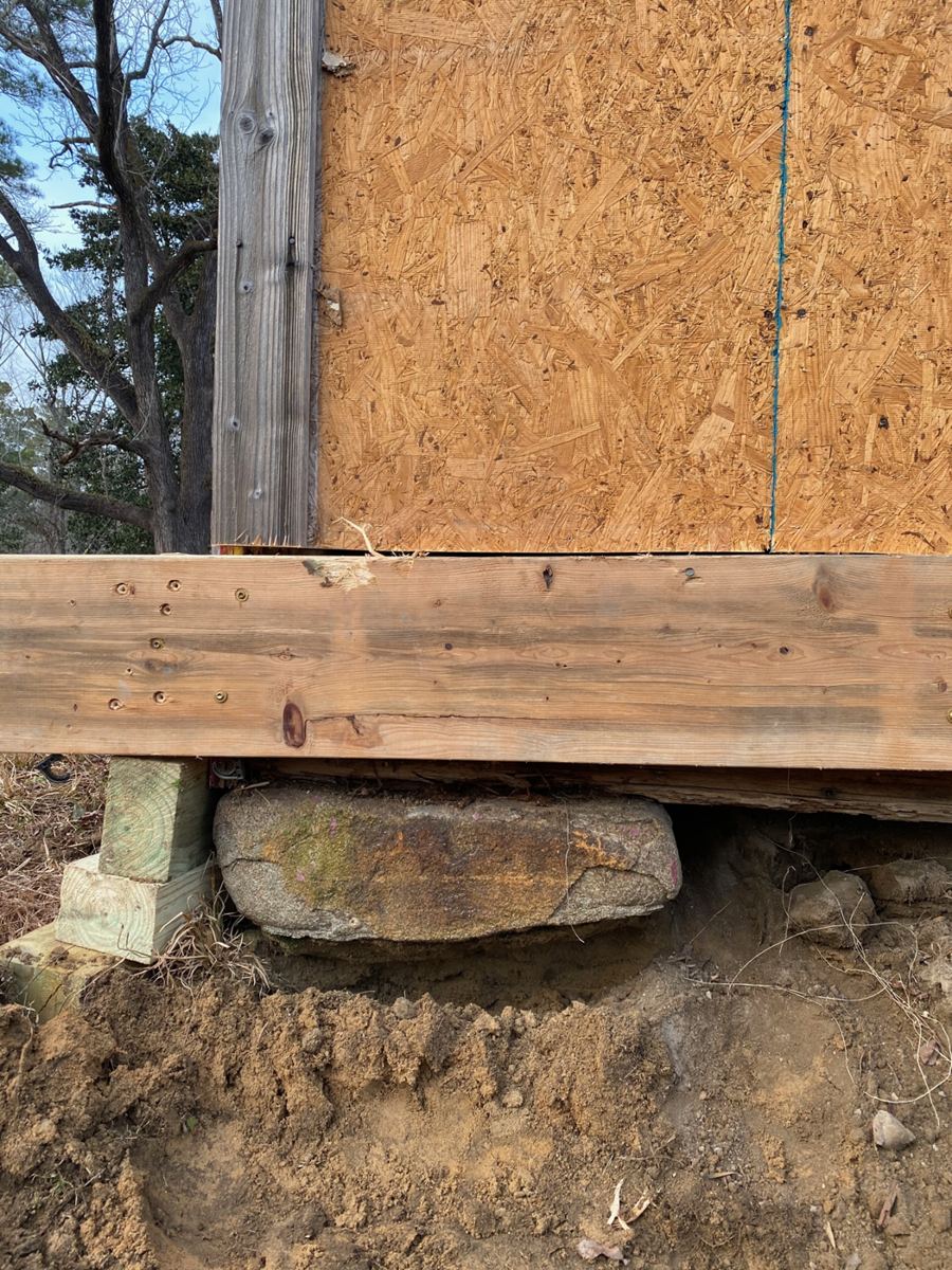 Suspending existing framing so we can place old foundation stone as part of the new masonry wall. A little touch of style with a nod to craftsmen of old