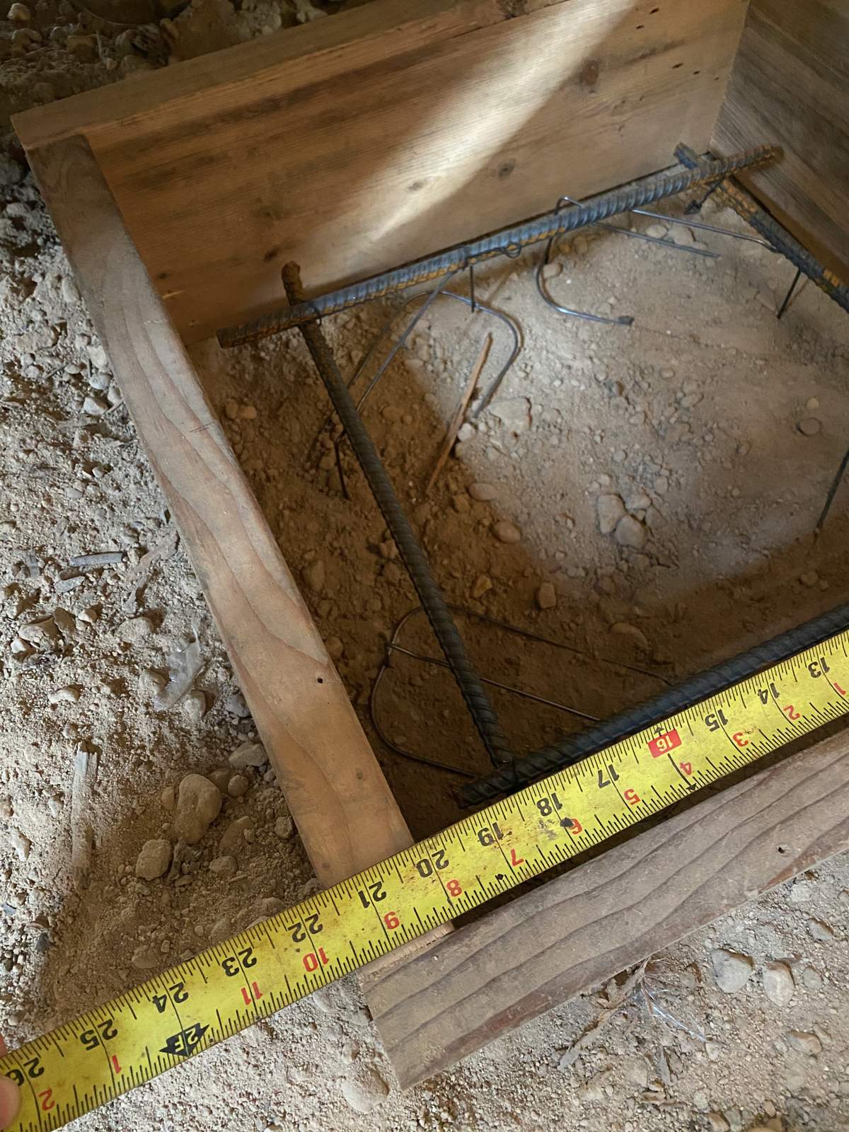 A pier footing with its rebar mat, ready to pour