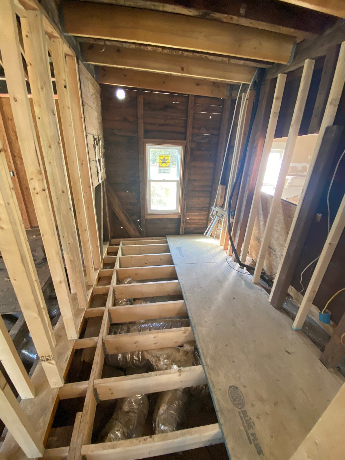 Reframing the bathroom floor on new foundation piers