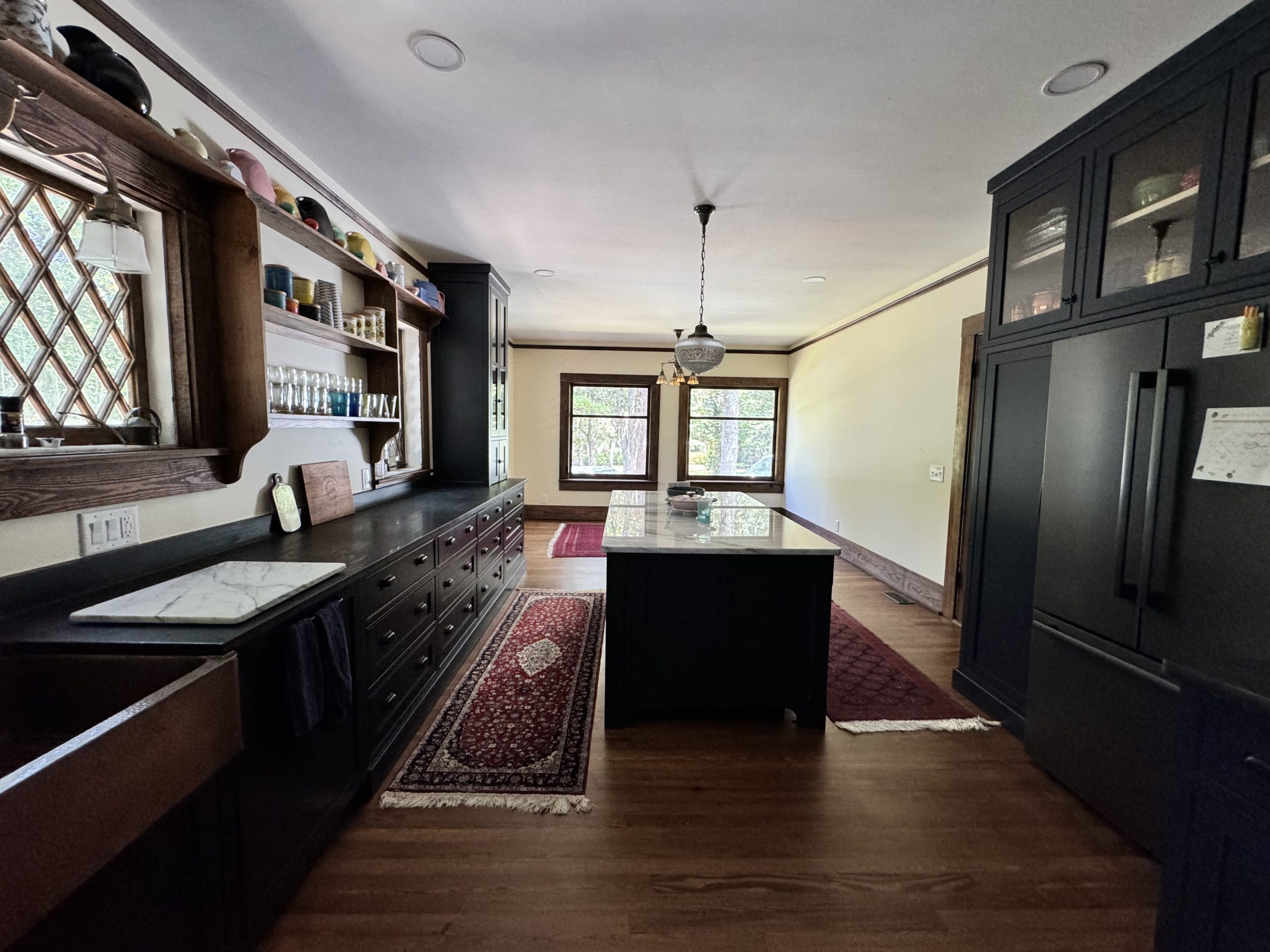 Custom cabinetry and finishes that honor the home's 1910 history