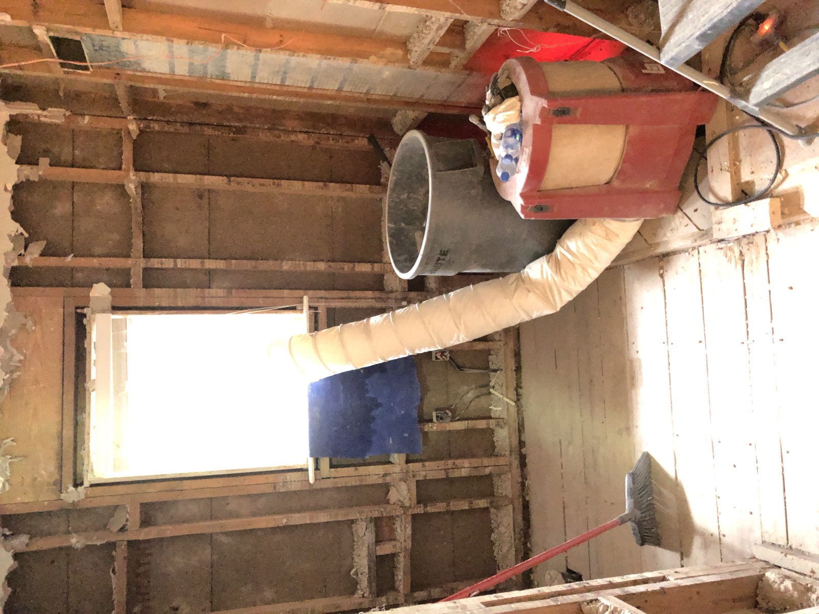 During: rough-in plumbing for the new zero-entry shower and double vanity layout