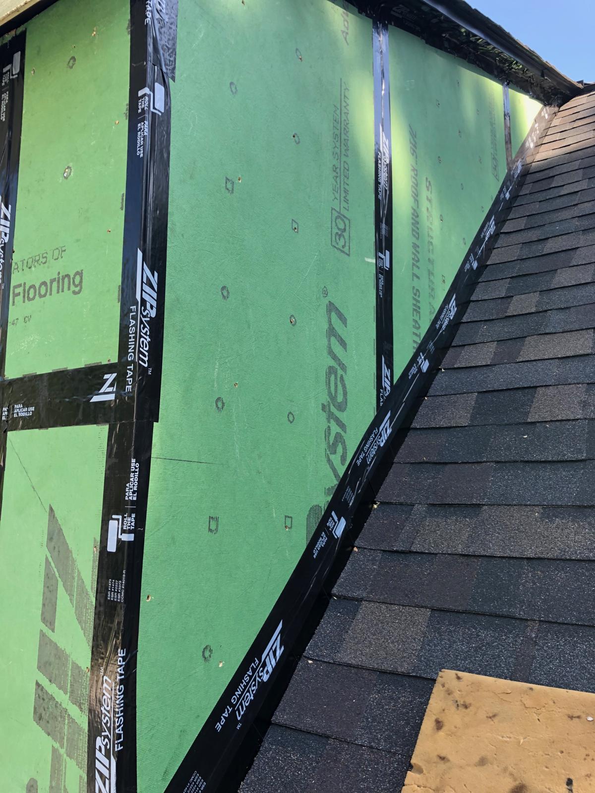 New architectural shingles meeting the taped ZIP System dormer wall